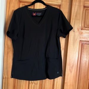 Urbane performance scrub top